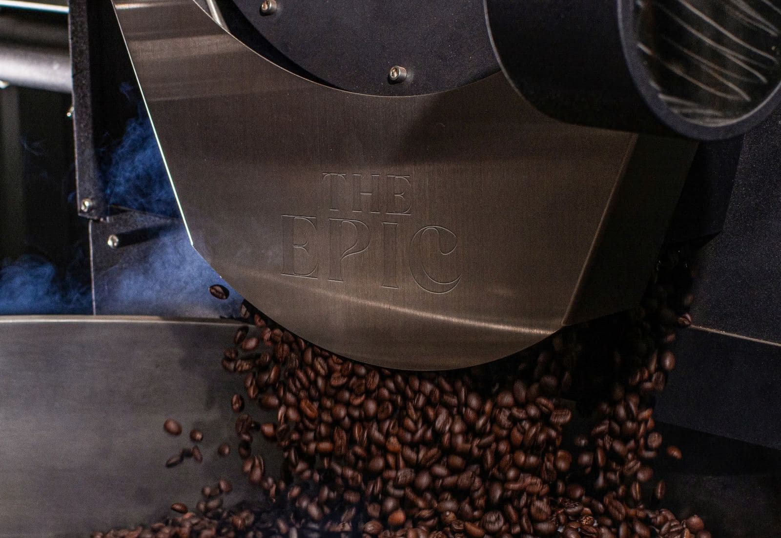 Roasted beans dropping into the cooling tray